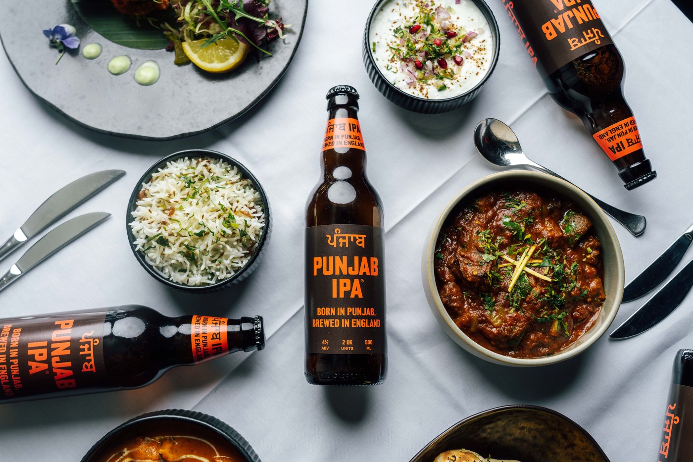 Punjab IPA with Indian food spread